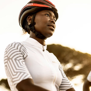 ladies white cycling jersey with geometric sleeves